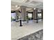Modern lobby with high tables, bar stools, and contemporary lighting at 172 Tall Ruff Dr, Las Vegas, NV 89148