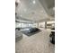Expansive lobby with multiple seating areas, stylish lighting, and a welcoming atmosphere at 172 Tall Ruff Dr, Las Vegas, NV 89148