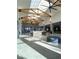 Spacious lobby features high ceilings with wood beams, skylights, and modern fixtures at 172 Tall Ruff Dr, Las Vegas, NV 89148