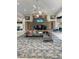 Comfortable lobby seating area with a stone fireplace and modern decor at 172 Tall Ruff Dr, Las Vegas, NV 89148
