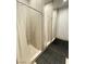 Community shower room with individual shower stalls at 172 Tall Ruff Dr, Las Vegas, NV 89148