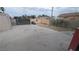 Spacious backyard with concrete and gravel areas, offering a low-maintenance outdoor space at 1910 Hoover St, North Las Vegas, NV 89030