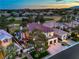 Elevated view of a home near a lush golf course, highlighting its red tile roof and picturesque surroundings at 1912 Glenview Dr, Las Vegas, NV 89134
