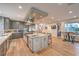 Spacious kitchen with stainless steel appliances, a central island, and an open layout into other living spaces at 1912 Glenview Dr, Las Vegas, NV 89134