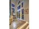 Bright living area with expansive windows and doors, seamlessly connecting indoor and outdoor spaces at 1912 Glenview Dr, Las Vegas, NV 89134