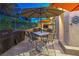 Outdoor dining area featuring a modern table and chairs, perfect for enjoying meals in the fresh air at 1912 Glenview Dr, Las Vegas, NV 89134