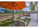Relaxing patio area with outdoor furniture, TV and golf course view at 1912 Glenview Dr, Las Vegas, NV 89134