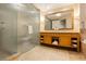 Elegant bathroom features a glass shower, soaking tub, and double sink vanity at 2000 Fashion Show Dr # 2604, Las Vegas, NV 89109
