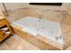 Close up view of the marble encased soaking tub with chrome hardware at 2000 Fashion Show Dr # 2604, Las Vegas, NV 89109