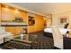 A bedroom with a bed, a kitchenette, a desk, and a view of the bathroom at 2000 Fashion Show Dr # 2604, Las Vegas, NV 89109