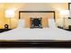 Bedroom featuring a king-size bed with decorative pillows and lamps on nightstands at 2000 Fashion Show Dr # 2604, Las Vegas, NV 89109