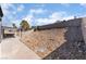 Backyard with block wall and covered patio at 2222 Little River Ct, Las Vegas, NV 89156