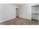 Cozy bedroom with carpet, closet and access to another room at 2222 Little River Ct, Las Vegas, NV 89156