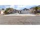 Charming single-story home with desert landscaping, mountain view, and a two-car garage at 2222 Little River Ct, Las Vegas, NV 89156