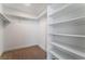 Well-organized walk-in closet with shelving and ample storage space at 2222 Little River Ct, Las Vegas, NV 89156