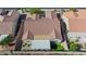 Aerial view of backyard showing patio, turf and roof at 2341 Rosendale Village Ave, Henderson, NV 89052