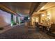 Expansive backyard featuring a covered patio with outdoor kitchen, providing ample space for entertainment and relaxation at 2341 Rosendale Village Ave, Henderson, NV 89052
