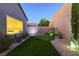 Well-maintained backyard features a putting green, enhancing leisure with lush greenery and modern design at 2341 Rosendale Village Ave, Henderson, NV 89052