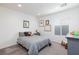 Comfortable bedroom with a full bed, carpet, and a dresser at 2341 Rosendale Village Ave, Henderson, NV 89052