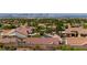 Panoramic view of a residential area with city skyline and verdant greenery at 2341 Rosendale Village Ave, Henderson, NV 89052
