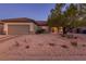 Charming single-story home with a tile roof and low-maintenance desert landscaping at 2341 Rosendale Village Ave, Henderson, NV 89052