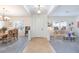A spacious, brightly lit foyer with tile flooring and views of the dining and living areas at 2341 Rosendale Village Ave, Henderson, NV 89052