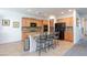 Well-equipped kitchen with granite countertops, a breakfast bar, and modern stainless-steel appliances, perfect for cooking at 2341 Rosendale Village Ave, Henderson, NV 89052