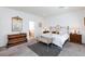 Bright main bedroom featuring natural light, carpet, and a calm atmosphere at 2341 Rosendale Village Ave, Henderson, NV 89052