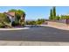 Street leading to mountain views and city views in the distance at 2341 Rosendale Village Ave, Henderson, NV 89052