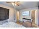 Spacious bedroom with a view into the en-suite bathroom at 2450 Tournament St, Las Vegas, NV 89142