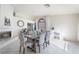 Inviting dining area with fireplace, neutral walls, and tile flooring at 2540 Hummingbird Hill Ave, Henderson, NV 89074