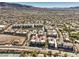 Expansive aerial view showcasing a meticulously planned residential community nestled against a backdrop of scenic mountains at 2555 Hampton Rd # 4204, Henderson, NV 89052