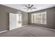 Bedroom featuring neutral paint, window with blinds, and carpet at 2555 Hampton Rd # 4204, Henderson, NV 89052
