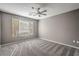 Bedroom featuring carpet, neutral paint, and natural light from window at 2555 Hampton Rd # 4204, Henderson, NV 89052