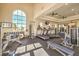 Bright gym with cardio equipment, weights, and fitness accessories in a spacious setting at 2555 Hampton Rd # 4204, Henderson, NV 89052