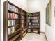 Well-organized library with full bookshelves and decorative accents at 2555 Hampton Rd # 4204, Henderson, NV 89052