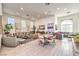 Spacious living room with tile floors, recessed lighting, comfortable seating, and large windows at 2555 Hampton Rd # 4204, Henderson, NV 89052