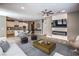 Open-concept living space with modern décor, light wood floors, and a seamless flow to the kitchen area at 2555 Hampton Rd # 4204, Henderson, NV 89052
