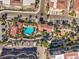 Beautifully landscaped community with a refreshing pool, mature landscaping, and ample parking at 2555 Hampton Rd # 4204, Henderson, NV 89052