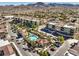 Overhead view of the community pool, surrounded by palm trees, offering a resort-style experience at 2555 Hampton Rd # 4204, Henderson, NV 89052