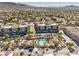 Inviting aerial shot of the community pool area, complete with ample lounge seating and lush landscaping at 2555 Hampton Rd # 4204, Henderson, NV 89052