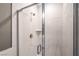 Bathroom featuring a shower stall with a glass door and custom walls at 2555 Hampton Rd # 4204, Henderson, NV 89052