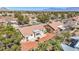 Aerial view of the property showcasing the roof, backyard and desert landscaping at 2628 Showcase Dr, Las Vegas, NV 89134