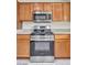 Close up of kitchen appliances featuring a stainless steel microwave and stove at 2628 Showcase Dr, Las Vegas, NV 89134