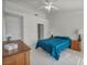 Bedroom showcasing tile flooring and a ceiling fan at 2628 Showcase Dr, Las Vegas, NV 89134