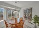 Charming breakfast nook surrounded by bright windows at 2628 Showcase Dr, Las Vegas, NV 89134