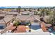 Beautiful single-story home with desert landscaping, a well-manicured yard, a two-car garage, and a charming front porch at 2628 Showcase Dr, Las Vegas, NV 89134