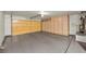 Spacious garage with epoxy flooring, built-in cabinets, and ample storage space at 2628 Showcase Dr, Las Vegas, NV 89134