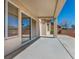 Covered backyard patio with view of stone landscaping and the house exterior at 2628 Showcase Dr, Las Vegas, NV 89134