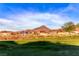 Golf course backyard view with mountain range as a backdrop at 2872 Sumter Valley Cir, Henderson, NV 89052